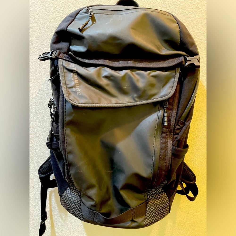 Black and Gray backpack which holds many items for travel, school, or work.